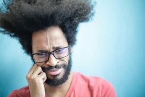 Photo by Andrea Piacquadio: https://www.pexels.com/photo/frustrated-ethnic-man-in-casual-wear-on-blue-background-in-studio-3965230/